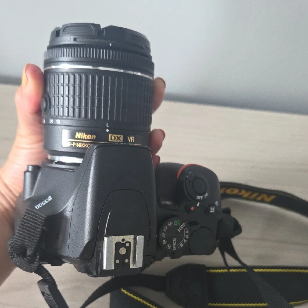 Nikon Black Camera D3500 with Zoom Lens and Black/Yellow Strap/ Charger Included